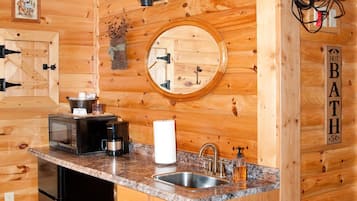 Fridge, microwave, coffee/tea maker, dining tables