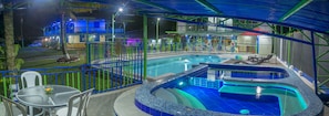 14 outdoor pools, open 6:00 AM to 8:30 PM, pool umbrellas, pool loungers