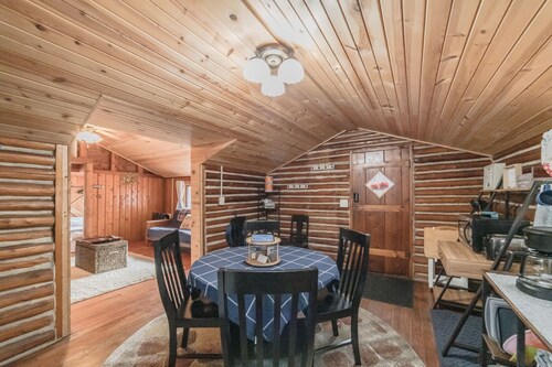 Sunrise Cove is a cozy cabin located within sight of Higgins lake & state land
