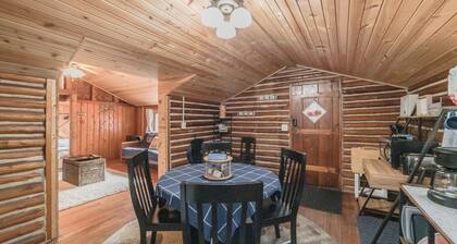 Sunrise Cove is a cozy cabin located within sight of Higgins lake & state land