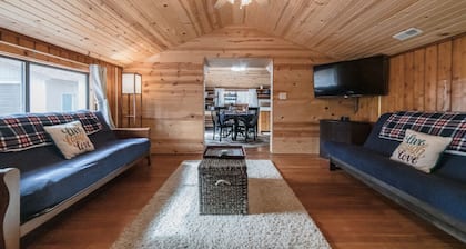 Sunrise Cove is a cozy cabin located within sight of Higgins lake & state land
