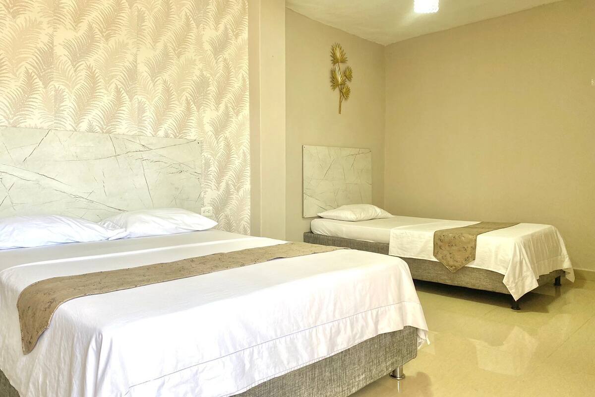 Habitación triple básica | Wifi gratis y ropa de cama 