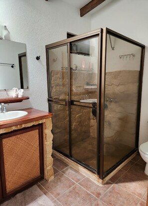 Shower, hair dryer, towels, soap