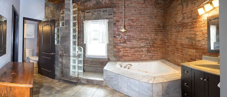 Bathtub, jetted tub, hair dryer, towels