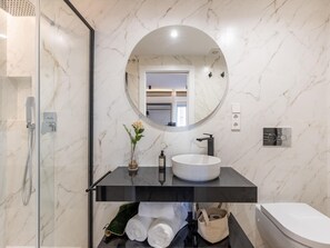 Shower, towels, soap, shampoo