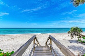 On the beach, sun-loungers, beach towels