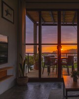 Deluxe Suite (#2) | Living area | 50-inch Smart TV with digital channels, TV, Netflix