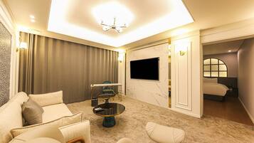 Executive Suite Family | 1 habitación, escritorio, wifi gratis y ropa de cama