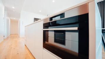Executive Retreat with Water Views | Private kitchen | Full-size fridge, microwave, oven, stovetop