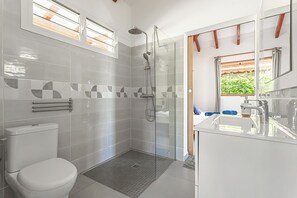 Shower, towels, soap, toilet paper