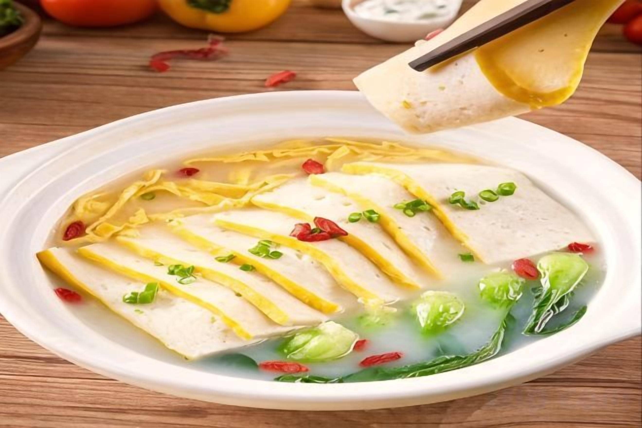 A bowl of soup with sliced ingredients and a ladle.