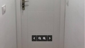 A white door with a metal handle and a keyhole. Above the door, the word "Dream" is displayed in a stylized font. - Dream Luxury Beach Front Majestic Sea-views (Palmanova)