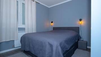 1 slaapkamer, een strijkplank/strijkijzer, wifi, beddengoed