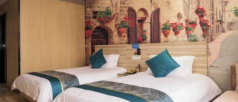 A hotel room with two beds, a stone wall mural, and potted plants.