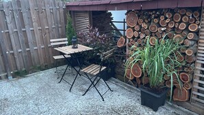 Apartment, 1 Bedroom, Patio, Garden View | Outdoor dining - Cozy Furnished Basement Apartment (Hannover)