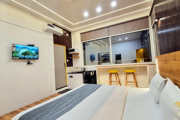 Presidential Studio Suite | Premium bedding, memory-foam beds, laptop workspace, free WiFi