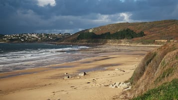 Beach nearby, sun loungers