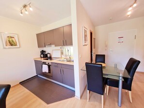 Fridge, oven, high chair