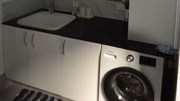 Shower, towels, soap, toilet paper
