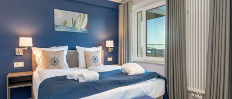 2 عدّة غرف نوم ومكتب وواي فاي مجانًا وملاءات أسرّة