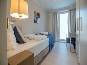 2 عدّة غرف نوم وواي فاي مجانًا وملاءات أسرّة