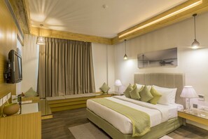 Suite Room | Down comforters, individually decorated, desk, iron/ironing board