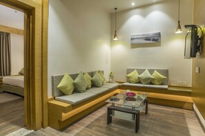 Suite Room | 1 bedroom, down comforters, individually decorated, desk