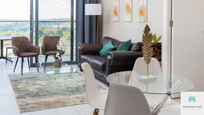 Comfort Apartment | Living area | TV - Menlyn Residence Luxury 2 Bed Apartment (Pretoria)