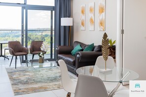 Comfort Apartment | Living area | TV - Menlyn Residence Luxury 2 Bed Apartment (Pretoria)