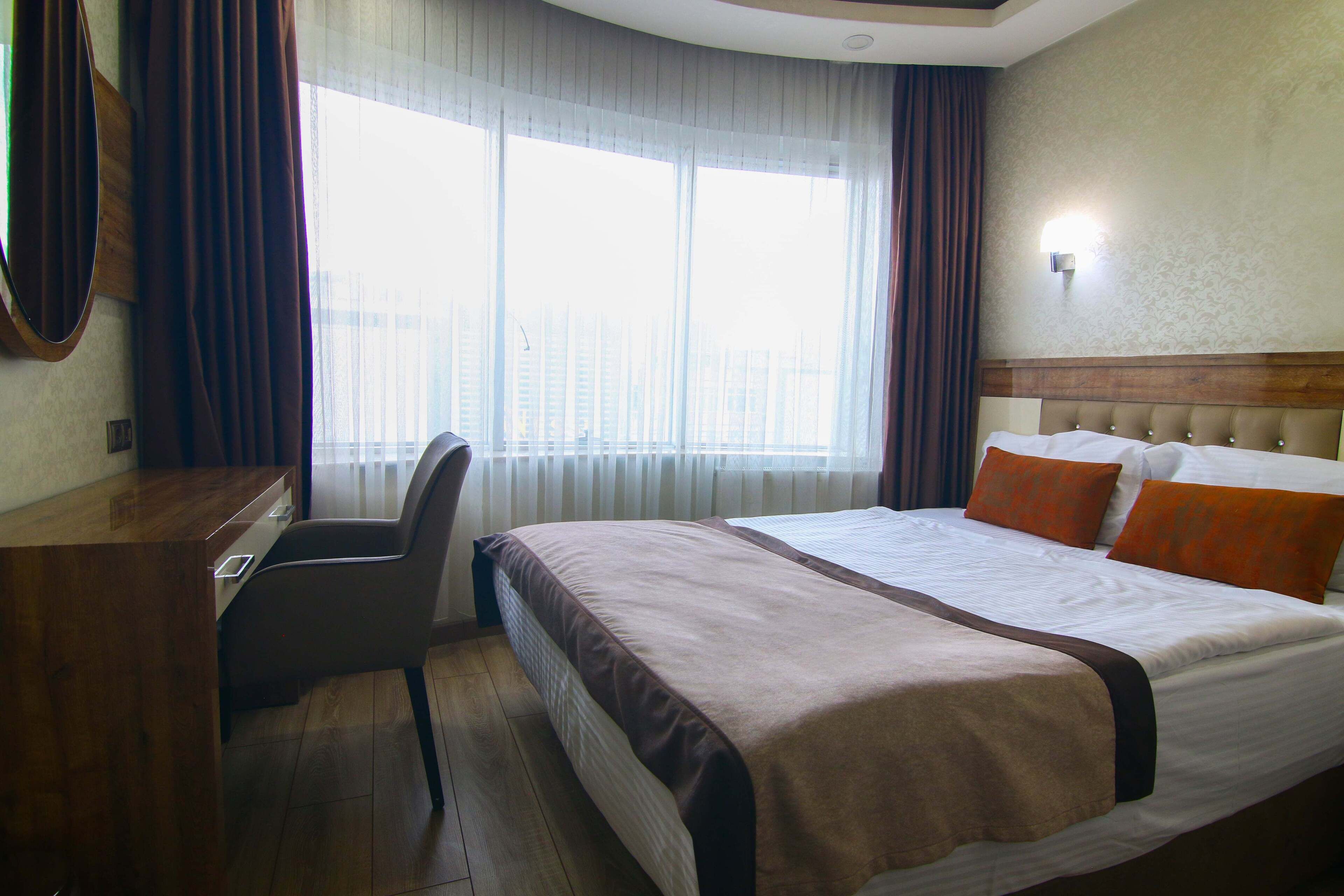 标准单人房, 1 间卧室 | 防过敏的被褥、迷你吧、客房内保险箱、遮光窗帘