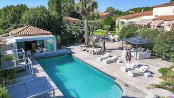 Seasonal outdoor pool, pool umbrellas, pool loungers