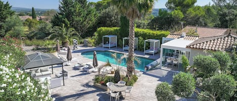 Seasonal outdoor pool, pool umbrellas, sun loungers