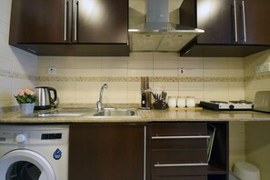 Standard Studio, Pool Access | Private kitchenette | Fridge, microwave