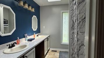 Combined shower/tub, jetted tub, hair dryer, bidet