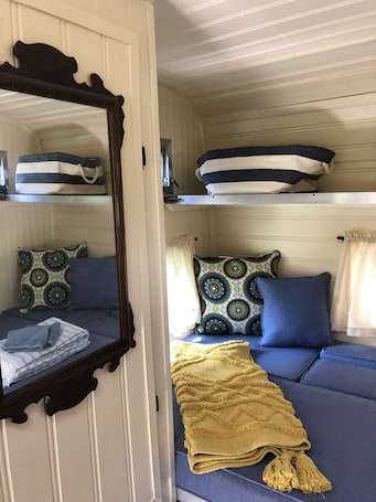 1 bedroom, bed sheets. Glamping with sheep in a renovated 1972 Ace camper on 48 acres