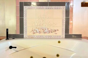 Shower, jetted tub, hair dryer, towels