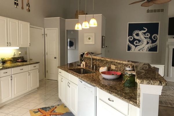 Large open kitchen with bar seats