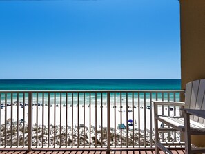 A balcony with a view of a beach. - Gulf Front, 5th floor Two Story Condo (Destin)