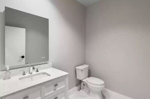 Shower, towels, soap, toilet paper