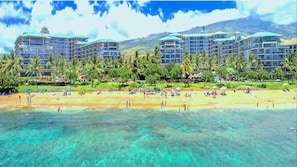 On the beach, sun loungers, beach towels