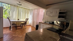 Fridge, microwave, stovetop, coffee/tea maker
