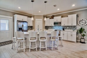 Microwave, dishwasher, coffee/tea maker, cookware/dishes/utensils