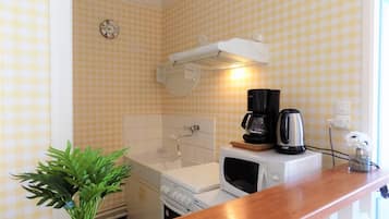 Fridge, microwave, toaster, cookware/dishes/utensils