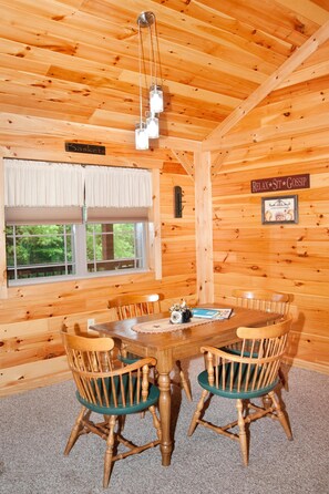Dining - Double cabin with 2 queen beds, 1 king bed, common porch and each unit has a private entrance and bath. (Flintstone)