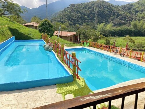 This place quietly and surrounded by mountains 1 BR Suite # 02