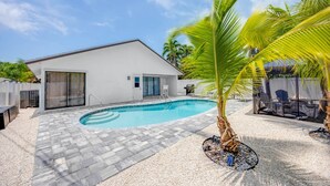Outdoor pool, a heated pool - Luxurious Modern 4BR, Heated Pool near Beach and Mercato! Newly Renovated! (Naples)
