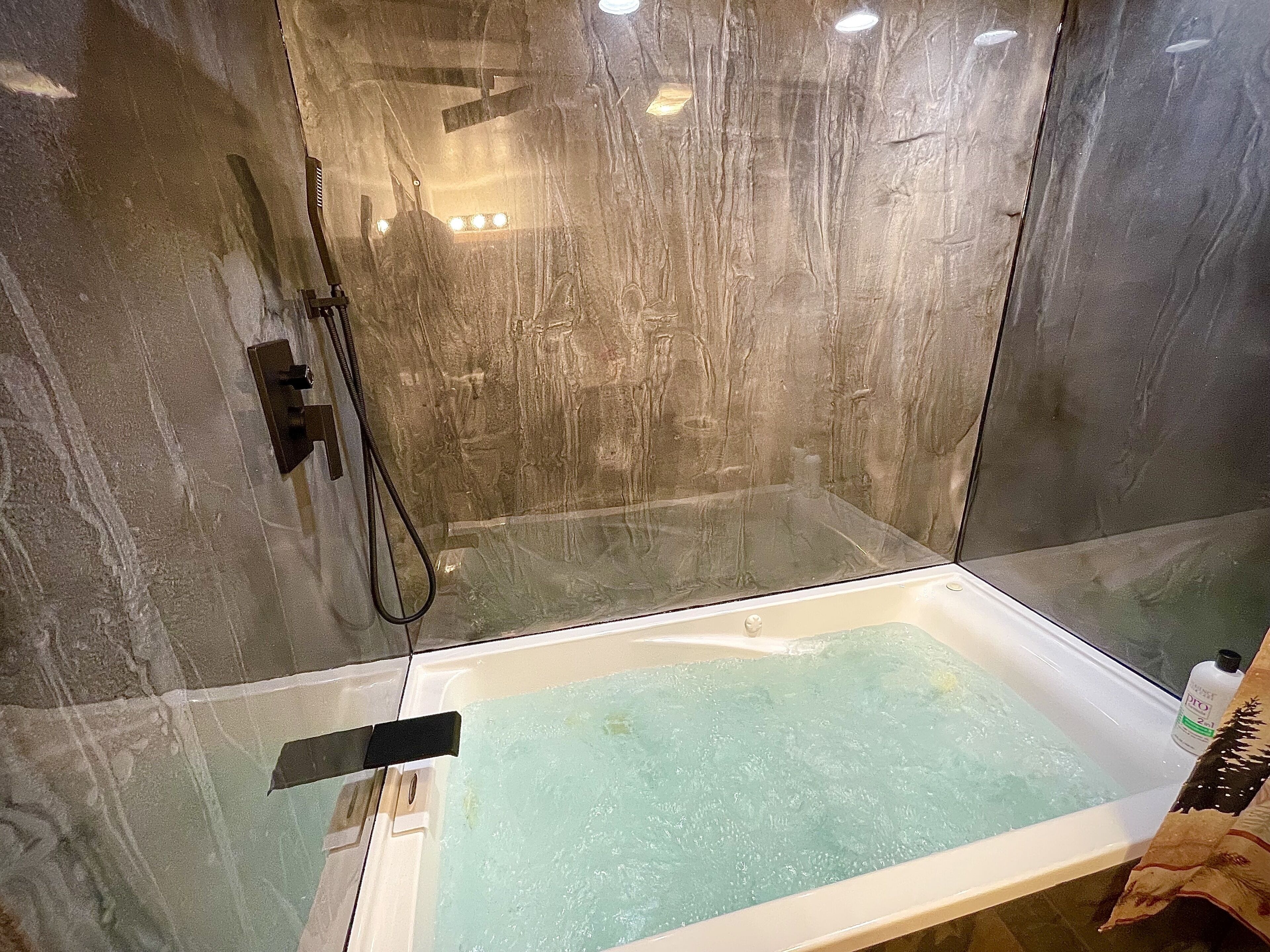 Bathtub, hair dryer, towels