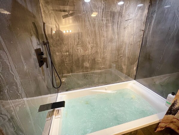 Bathtub, hair dryer, towels