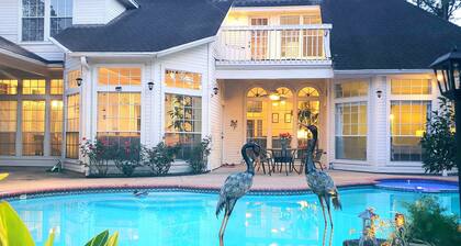 Modern Custom Home in Prestigious Champions Golf Club Community