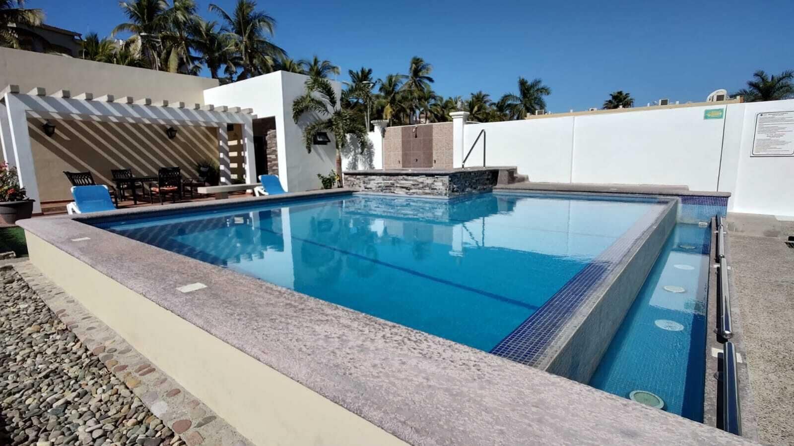 outdoor pool, open 8:00 am to 9:00 pm, pool umbrellas, pool loungers